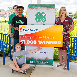 presenting July Charity of the month check - Alachua County 4-H