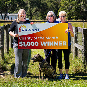 presenting October Charity of the Month check - Williston Animal Grouup